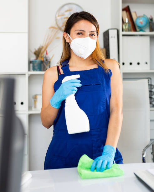 istock Woman office cleaner in mask 1263697588
