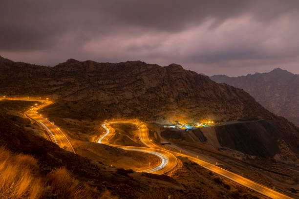 istock Traffic light trails along the zig zag road in Al Hada, Saudi Arabia 1263698308