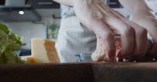 istock Preparing stuffed chicken breast rolls with bacon and cheese 1263698445