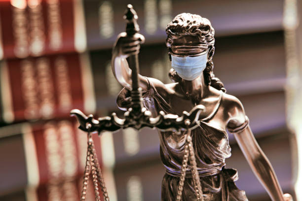 istock Lady Justice Wearing A Protective Face Mask 1263700740