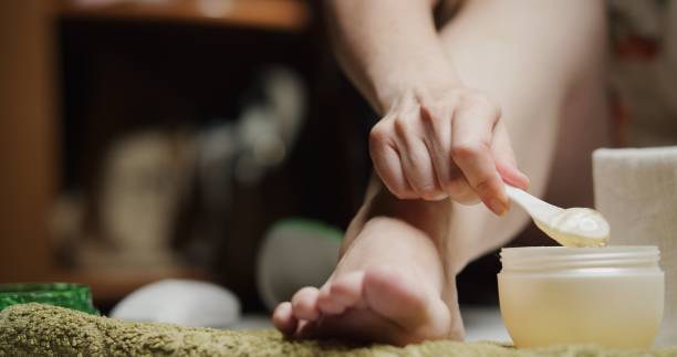 istock Woman taking self pedicure at home 1263701057