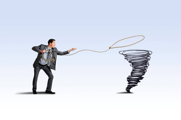 istock Man Attempting To Lasso A Tornado 1263701103