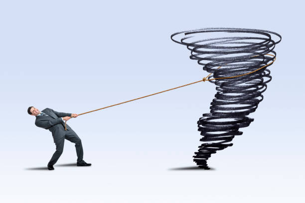 istock Man Attempting To Lasso A Tornado 1263701116