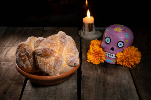 istock Composition with typical Mexican skull and cempazuchitl flowers on rustic wooden table. 1263701127