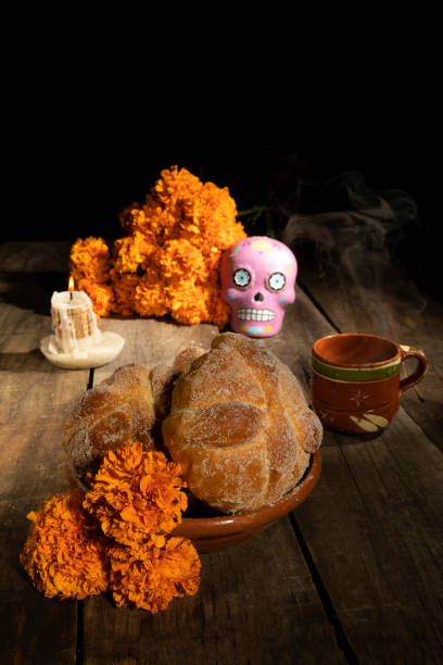 istock Composition with typical Mexican skull and cempazuchitl flowers on rustic wooden table. 1263701294