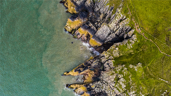 The image of this section of the coast was captured by a drone being flown over the water as the tide comes in.