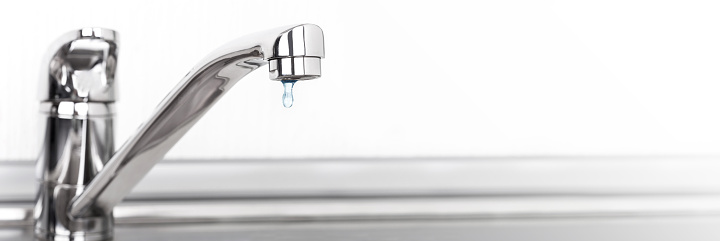 Faucet and water drop. Long banner