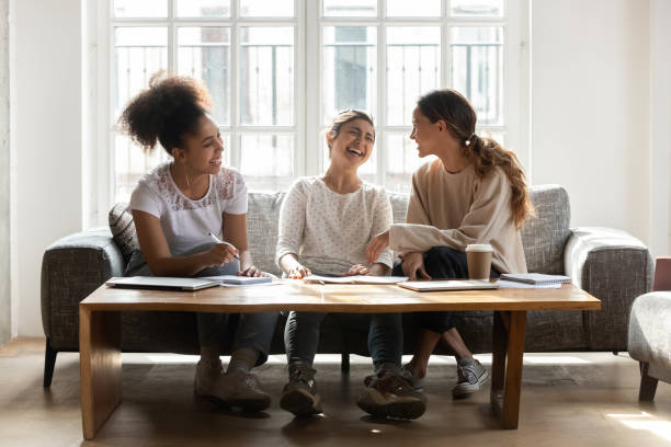istock Diverse girls friends laughing chatting take break during study process 1263705755