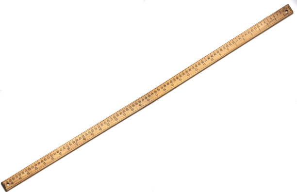 istock Diagonally placed yardstick with inches and centimeters 1263707990