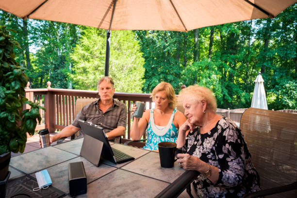 istock Watching news updates outdoors during Covid-19 1263712560