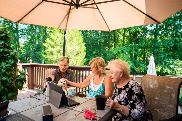 istock Watching news updates outdoors during Covid-19 1263712564
