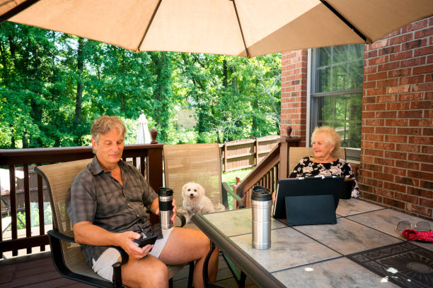 istock Social distancing outdoors under an umbrella 1263712567