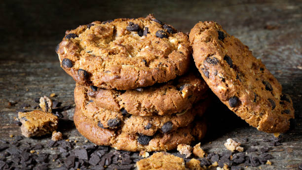 istock Chocolate cookies on grey table. Chocolate chip cookies shot 1263716649