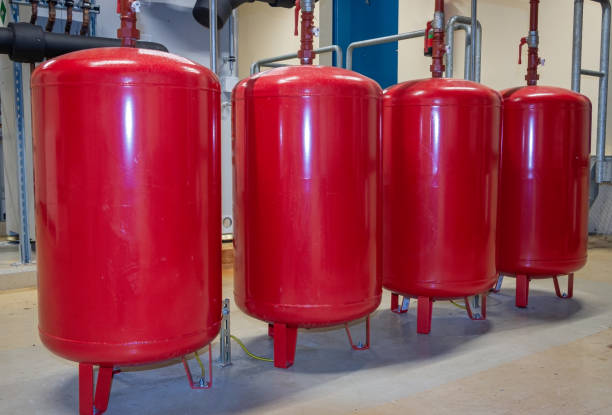 istock bright red expansion vessels arranged in a row 1263721126