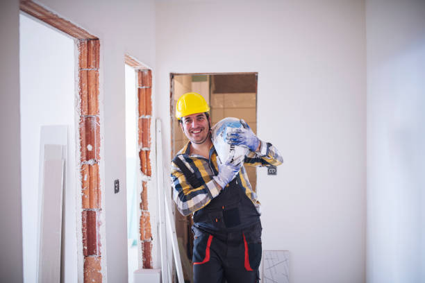Charming Construction Worker Carrying A Sack Of Cement