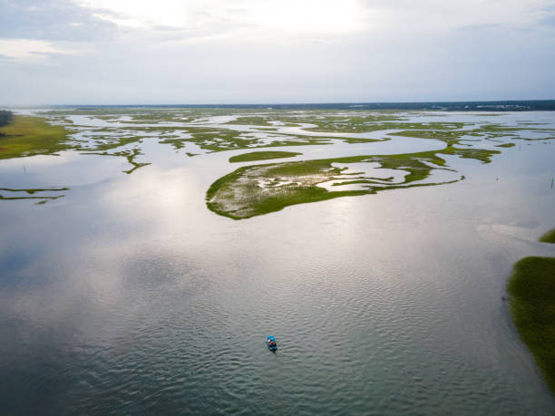 Boating around the Crystal Coast in Onslow County, North Carolina Aerial view of boating around islands on the Crystal Coast in Onslow County, North Carolina. emerald isle north carolina stock pictures, royalty-free photos & images