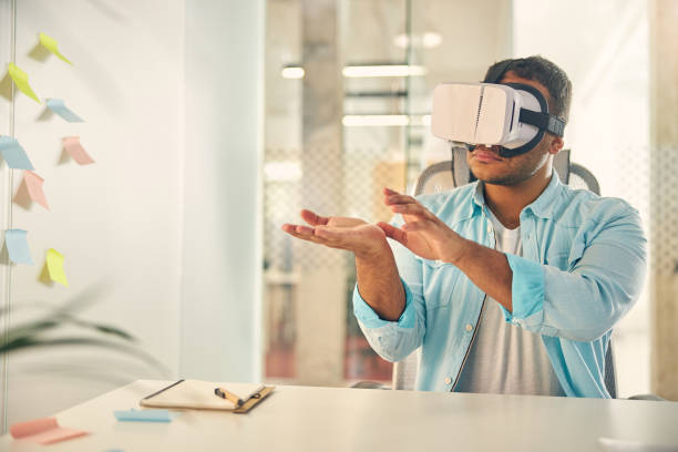 istock Kind brunette male sitting in mask for virtual reality 1263737155