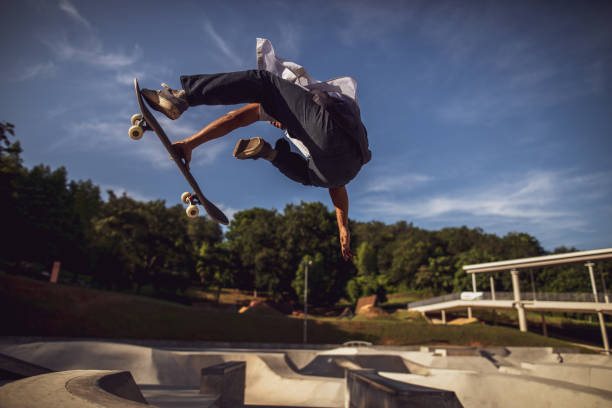 istock Asian man playing skateboard at skatepark 1263740221