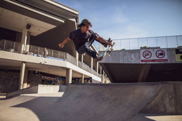 istock Asian man playing skateboard at skatepark 1263740224