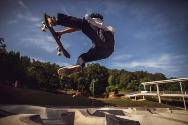 istock Asian man playing skateboard at skatepark 1263740225