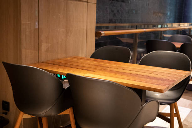 istock Tables and chairs under the light indoors 1263741320
