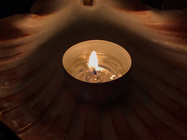istock Top view of burning tealight candle 1263742999