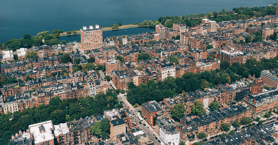 Panoramic aerial view of Boston financial district, historic center, Beacon Hill and Charles River