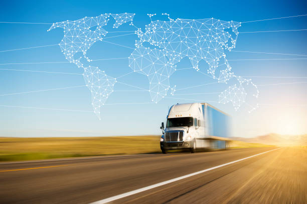 istock Container Truck on Highway with Polygon Network World Map Graphic 1263753002