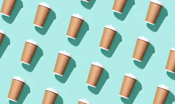 istock Blank craft take away big paper cup for coffee or drinks with hard light. 1263755091