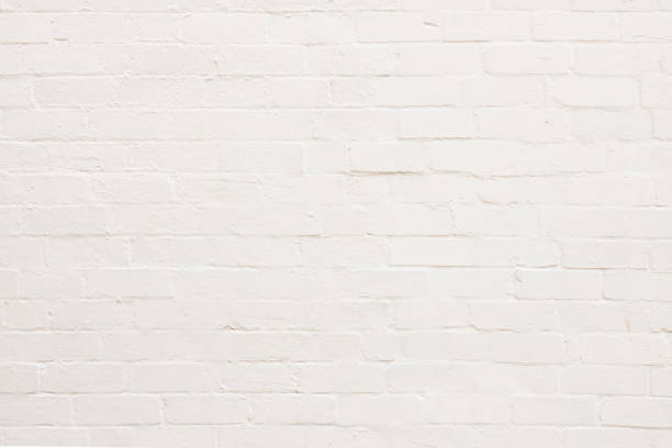 partie d’un mur de briques blanches - seamless brick repetition pattern photos et images de collection