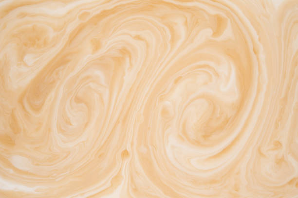 istock Texture coffee mix cream and milk top view 1263758689