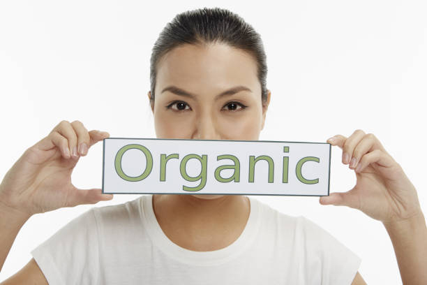 istock Woman holding up a placard 1263762686