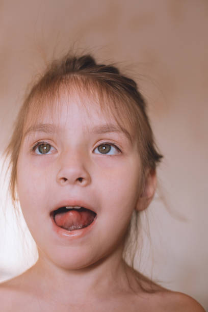 istock the little girl plays the language 1263764521