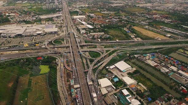istock Futuristic Autonomous Driverless Cars on the Elevated Expressway 1263768717