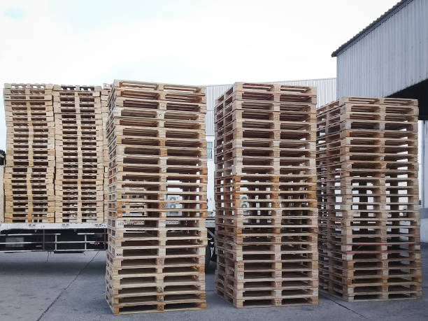 istock Stack of wooden pallets in the warehouse stock. 1263770384