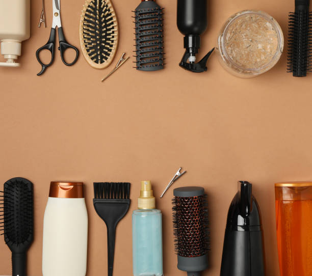 istock Composition with hairdresser accessories on brown background, space for text 1263782505