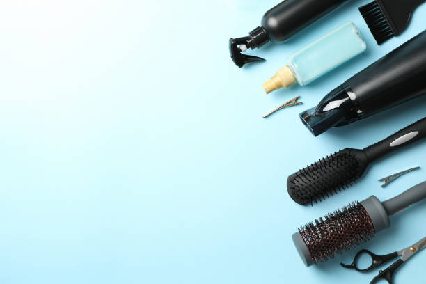 istock Composition with hairdresser accessories on blue background 1263782541