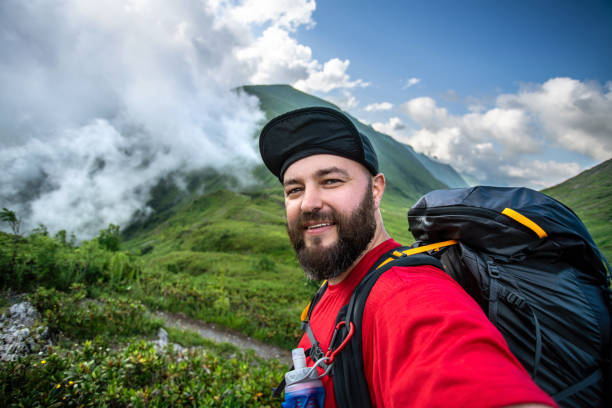 istock Traveler taking selfie in the mountains 1263786033
