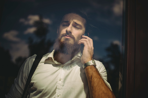 A fashionable long-haired man - Modern businessman - Lung beard