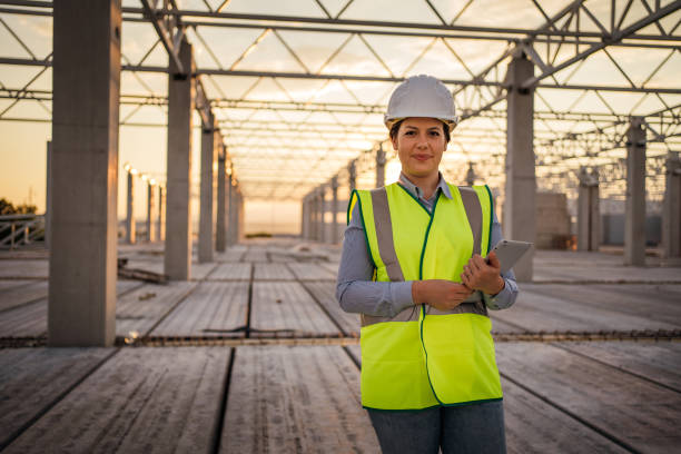 istock Portrait of female engineer at the construction site 1263788771
