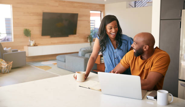 istock African American Couple Using Laptop To Check Finances At Home 1263790802
