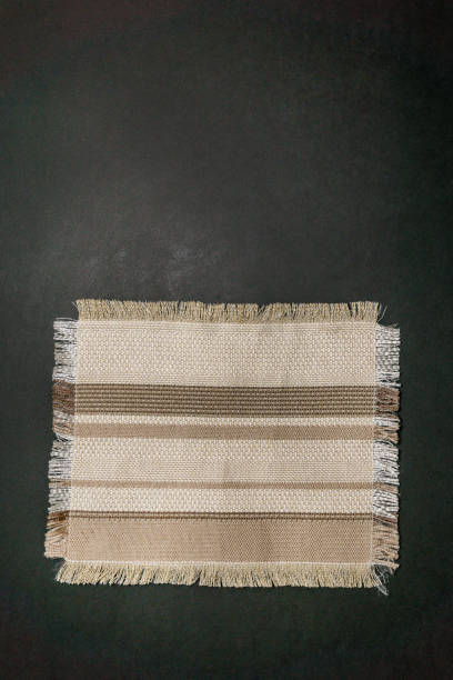 istock textiles over the black kitchen table. Top view with space for copying vertical photo 1263791031