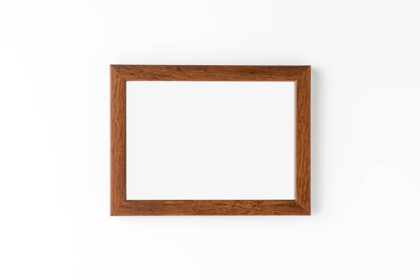 istock Wooden photo frame with copyspace isolated on white background 1263800616