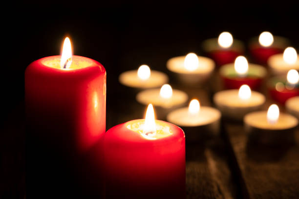 istock Burning candles in the dark 1263824710