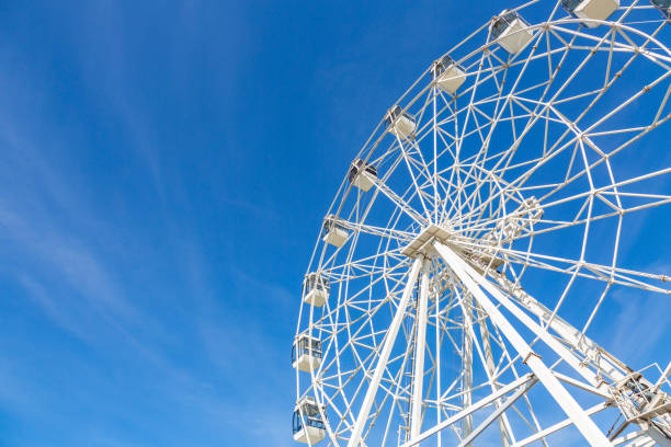 istock Big white ferris wheel in the park 1263825915