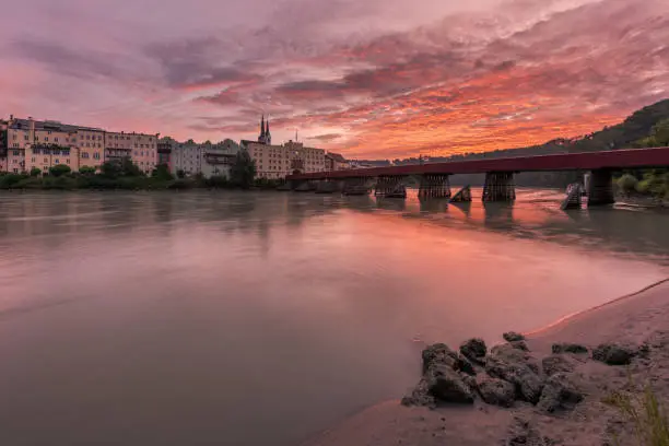 View from the banks of the Inn to the Red Bridge and Wasserburg am Inn at sunrise