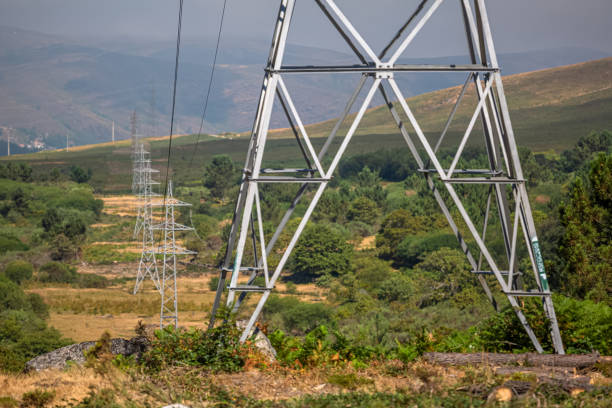 istock View at the mountains with high voltage electric posts 1263826930