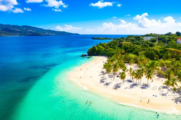 Aerial drone view of beautiful caribbean tropical island Cayo Levantado beach with palms. Bacardi Island, Dominican Republic. Vacation background