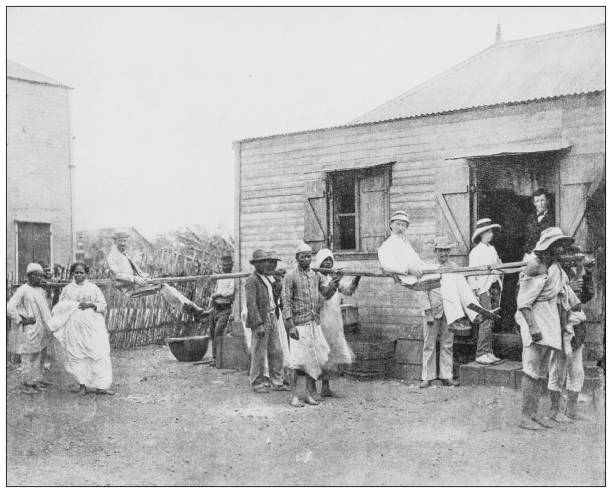 Antique black and white photograph: Madagascar Antique black and white photograph: Madagascar african slaves stock illustrations