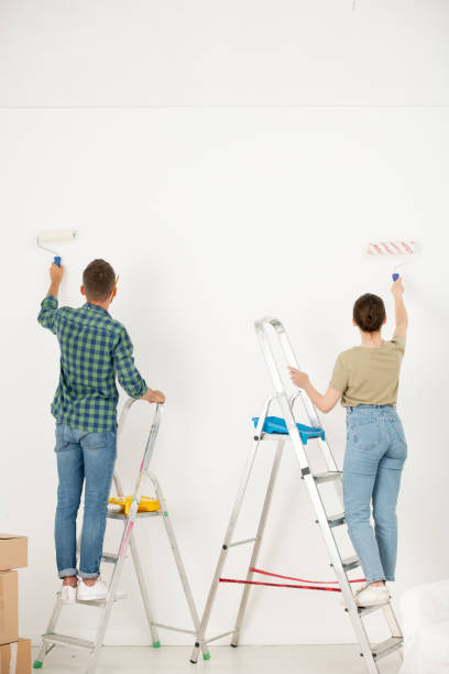 istock Young couple making interior of dream 1263831869
